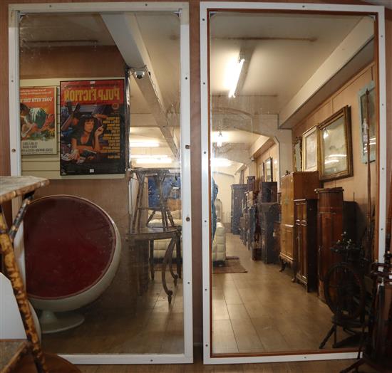 A near pair of old plated large mirrors W.124cm and 118cm